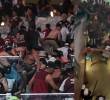 Hinchas de Lanús se enfrentaron a policías brasileros quienes trasladaron una gresca iniciada en los baños hasta las gradas. Fotos: Capturas de videos.