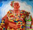 Eustiquia Amaranto Santana junto a un mural con su rostro en su casa ubicada en Turbo. FOTO: MANUEL SALDARRIAGA