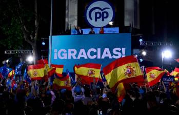 En la noche de este domingo hubo expresiones de celebración de la derecha española. FOTO AFP