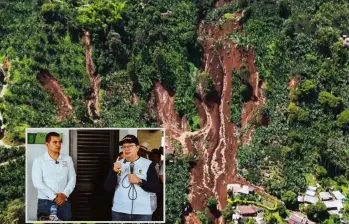 Adelante, el alcalde de Pueblorrico junto al director del Dagran. Atrás, la magnitud del deslizamiento. FOTO: imágenes tomada de redes