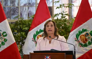La expresidente Dina Boluarte en un discurso. FOTO: AFP