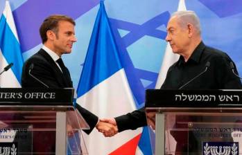 El presidente de Francia, Emmanuel Macron, y el primer ministro de Israel, Benjamín Netanyahu. FOTO AFP