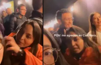 Momento en el que Diana Daza (de rojo) agrede a Tania Cortés. FOTO CAPTURA DEL PANTALLA