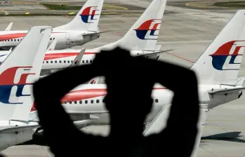 El vuelo MH370 de Malaysia Airlines cubría la ruta Kuala Lumpur - Pekín cuando desapareció el 8 de marzo de 2014. Llevaba 239 personas a bordo. FOTO: AFP