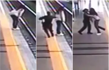 Momentos en los que la auxiliar de policía se abalanza contra una mujer y evita que se lance al a vía férrea del metro. FOTOS: Captura de video