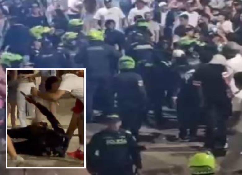 Adelante, el forcejeo en el que se habría accionado un arma de dotación. Atrás, la Policía enfrenta a los desadaptados. FOTO: Cortesía