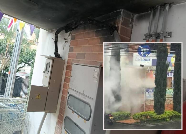 Adelante, las nubes de humo que salían del supermercado. Atrás, el punto eléctrico donde se habría originado el corto. FOTO: Cortesía Denuncias Antioquia.