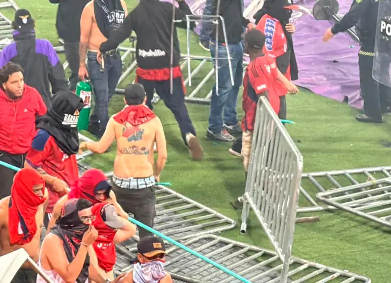 Estos fueron algunos de las hechos que se vivieron al final del compromiso entre DIM y Nacional, que dejó como campeón al verde paisa. FOTO: Cortesía