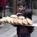 Reuters - Pan para la venta en Aleppo, Siria.