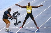 Bolt celebró su tercera medalla de oro olímpica en esta prueba. FOTO Reuters