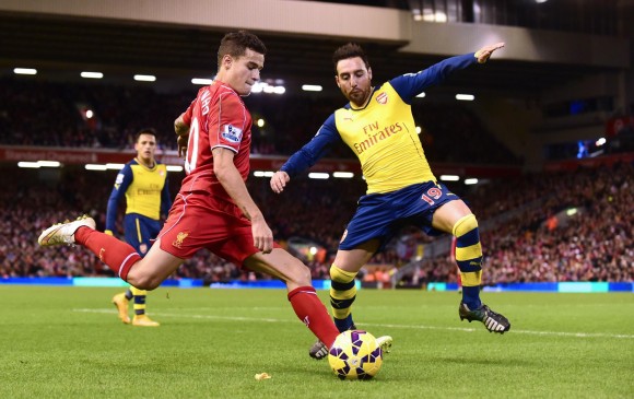 El duelo entre Liverpool y Arsenal resultó muy entretenido y terminó con empate a dos. FOTO AFP