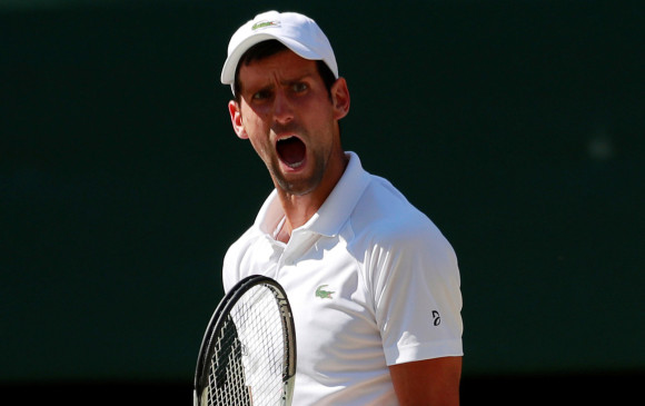 Djokovic se impuso por 6-2, 6-2 y 7-6 (3) al sudafricano Kevin Anderson en la final de Wimbledon. FOTO REUTERS