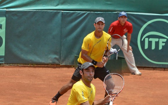 Farah (atrás) y Cabal, doblistas colombianos. FOTO colprensa