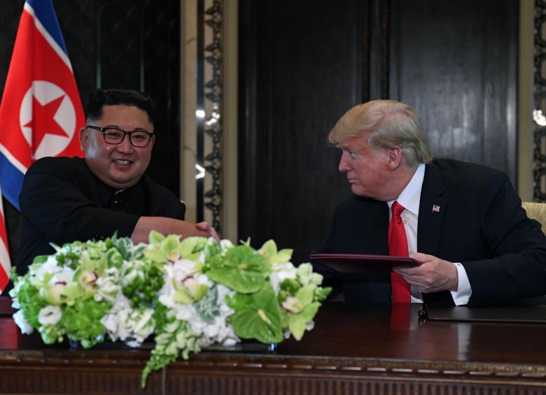 Kim Jong-un y Donald Trump. AFP