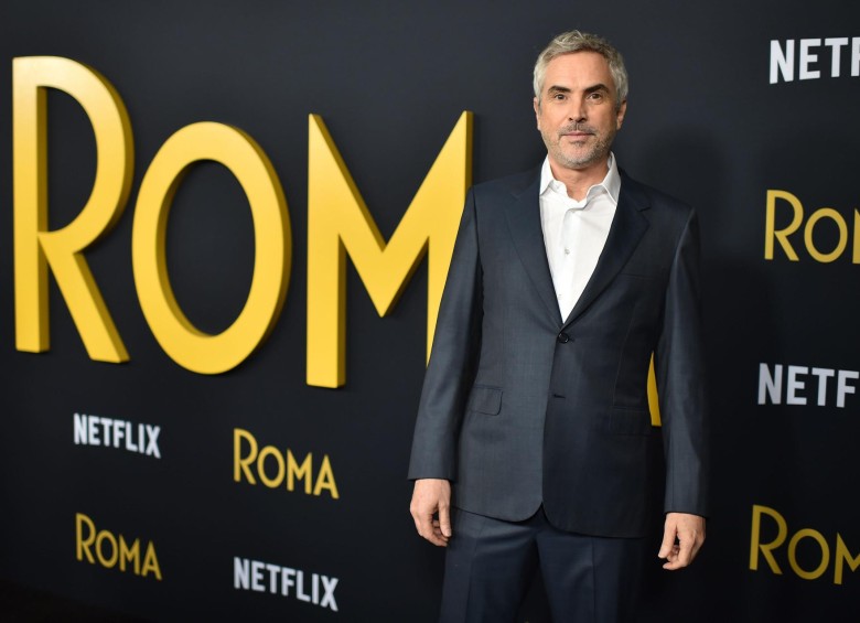 El director mexicano Alfonso Cuarón llega para el estreno de Roma, el 10 de diciembre de 2018. Foto: AFP