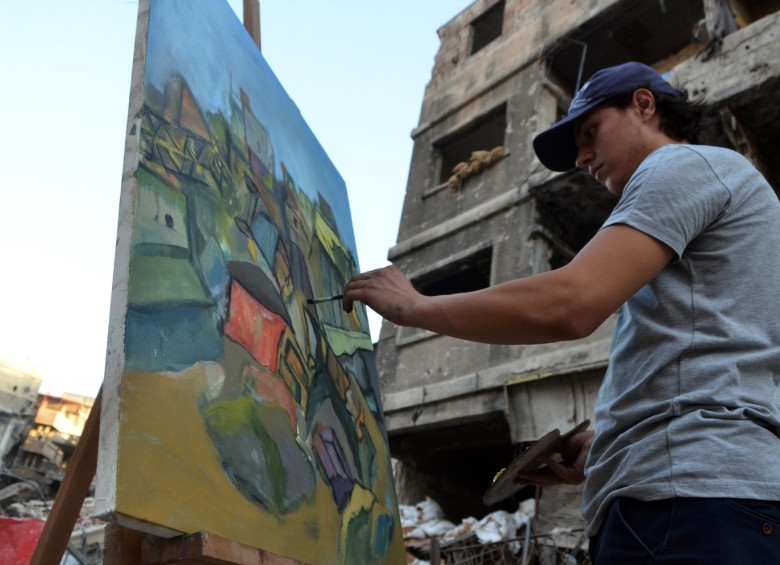 Pintar entre las ruinas de la guerra en Siria
