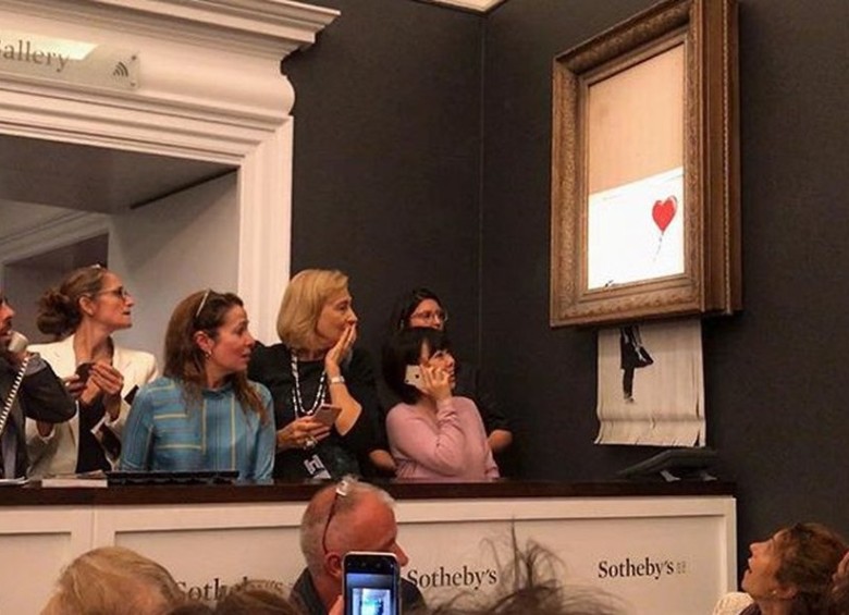 Una reproducción de la obra Girl With Baloon, se trituró parcialmente justo después de haber sido vendida. Foto: Instagram Banksy