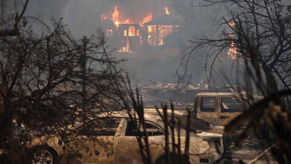 La destrucción de los incendios ha sorprendido a las autoridades, ya que en apenas unas horas el viento ha extendido las llamas por miles de hectáreas. FOTO EFE