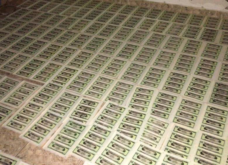 En la vivienda donde funcionaba la imprenta fueron hallados 140 mil dólares. FOTO COLPRENSA