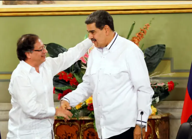 El presidente Gustavo Petro y Nicolás Maduro, presidente venezolano preso en EE. UU. Foto: AFP