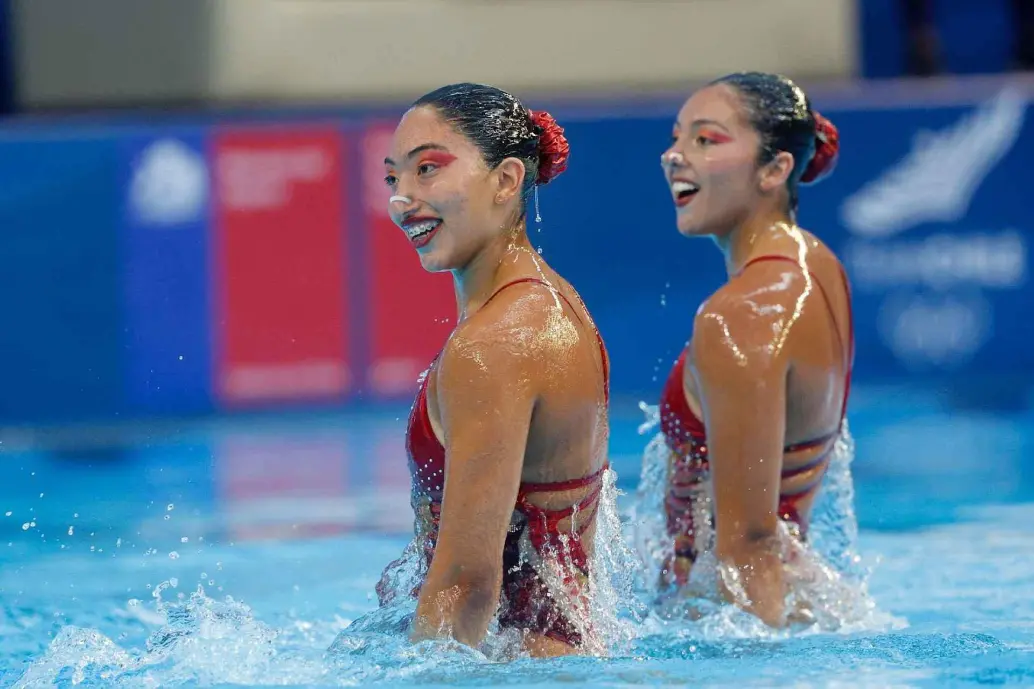 Las antioqueñas Luisa Botero y Mabel Tobón lograron la medalla de plata en el dúo femenino en la prueba técnica de la competencia que se desarrolla en Santiago de Chile. FOTO PANAM SPORT