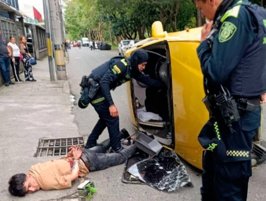 Este hombre fue capturado en la autopista Sur, en Medellín, luego de una persecución de más de 30 kilómetros desde Rionegro que terminó con el taxi volcado. El detenido es señalado de participar en una balacera que dejó un lesionado en una estación de gasolina. FOTO: CORTESÍA