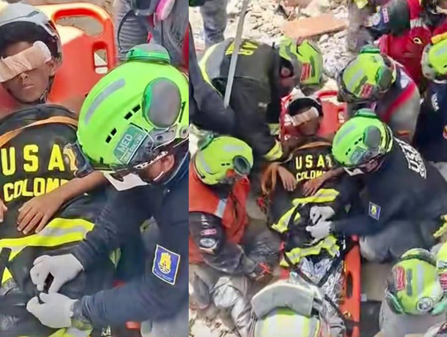 El equipo Usar Col-1, que tiene entre sus integrantes a ocho integrantes del Cuerpo de Bomberos de Envigado, rescataron a Moises, un niño de 11 años, en La Guaira. FOTOS: TOMADAS DE VIDEO