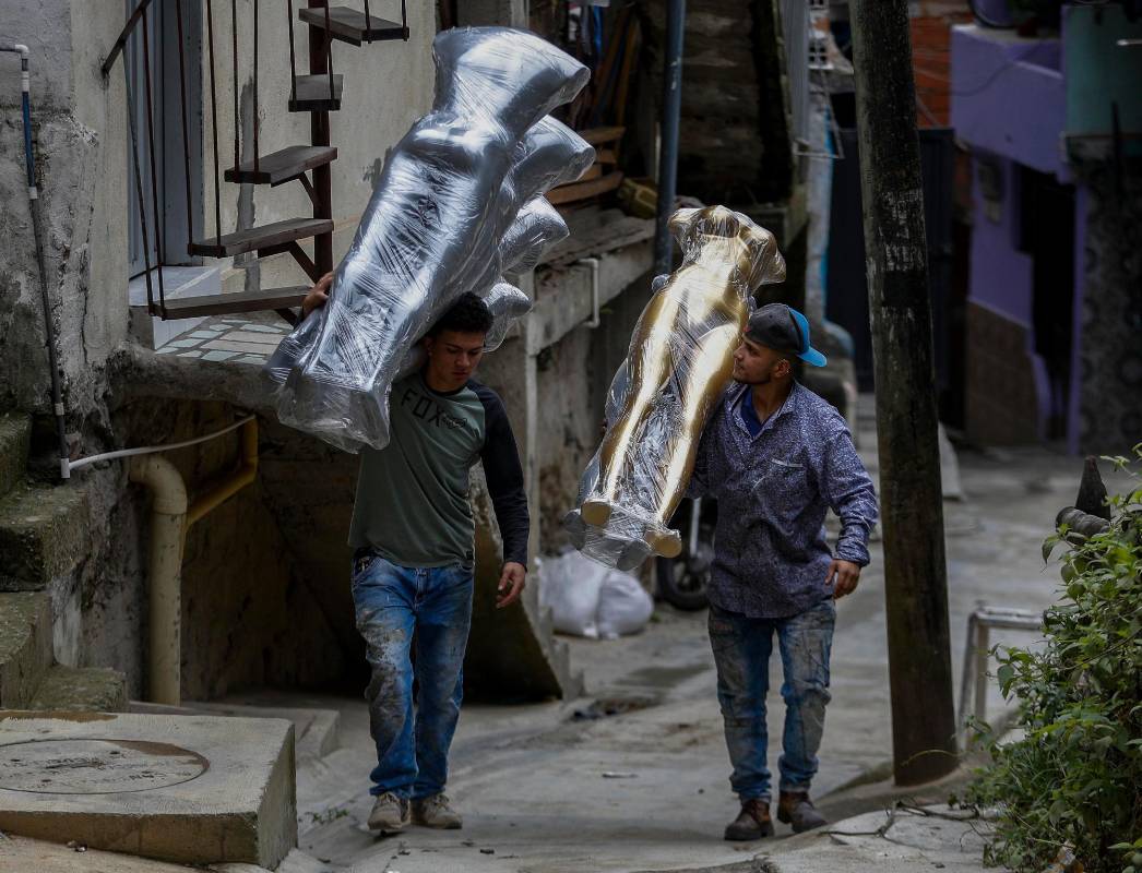 En el barrio, hoy son orgullo y ejemplo, una forma para esquivar la violencia. Foto: Manuel Saldarriaga Quintero.