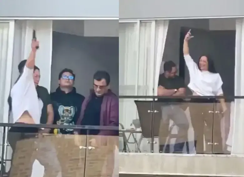 La mujer generó revuelo al disparar al menos cinco veces al aire desde el piso 12 de un conjunto residencial en Bogotá. FOTO: Captura de video