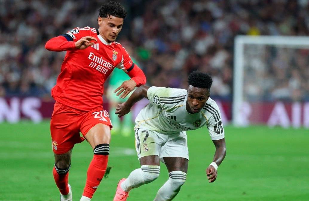 Richard Ríos junto a Vinícius Júnior en el partido entre el Real Madrid y el Benfica. FOTO GETTY
