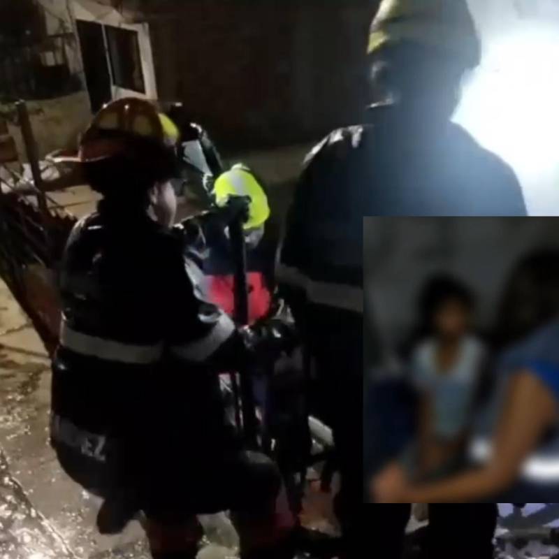 Rescate de una niña de 9 años que estaba sola en su casa en Medellín. FOTOS: CAPTURA DE VIDEO POLICÍA