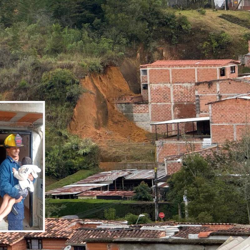 Adelante, uno de los bomberos de Rionegro rescatando a un menor de edad. Atrás, la magnitud del deslizamiento. FOTO: Cortesía.