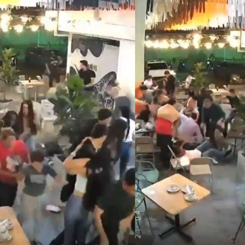 Ciudadanos salieron corriendo de un restaurante luego de percibir las detonaciones cerca al Batallón Agustín Codazzi, en Palmira, Valle. Foto: Captura de video redes sociales 