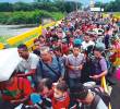 Venezuela registra el mayor éxodo en la historia de América Latina: 7,7 millones de migrantes y refugiados. Más del 80 % de la población vive en pobreza multidimensional, según la Encuesta Nacional de Condiciones de Vida (Encovi). Y por eso se escaparon de ese país más de 7,7 millones de ciudadanos. <span class=mln_uppercase_mln>FOTO</span> <b><span class=mln_uppercase_mln>AFP</span></b>