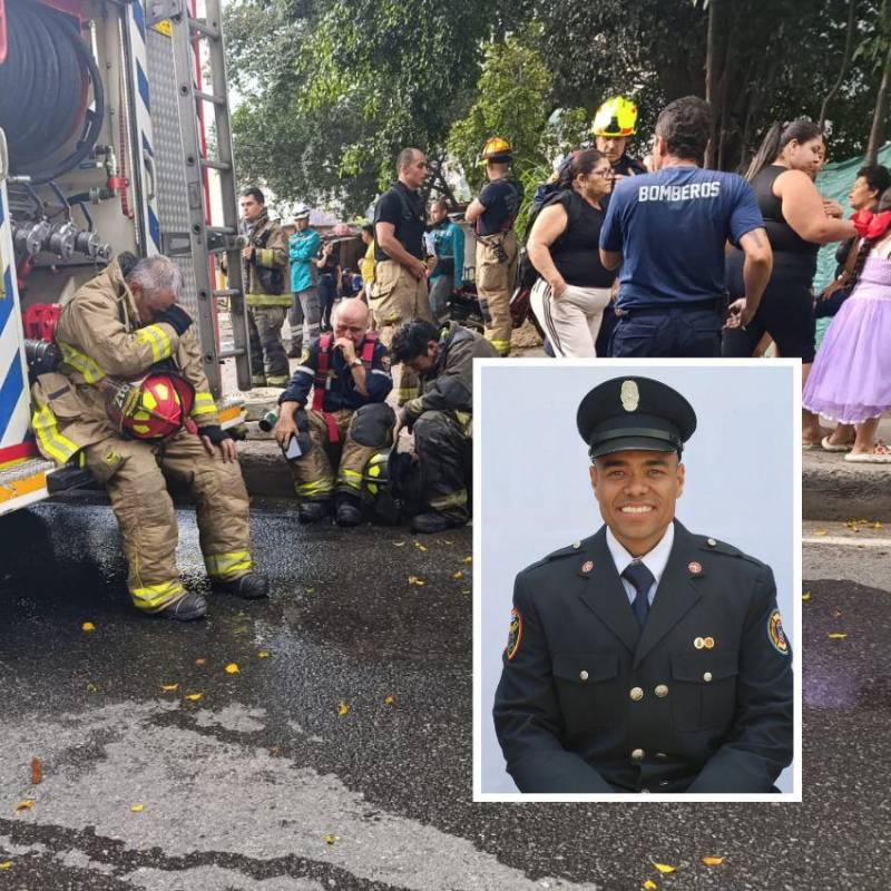 Los bomberos que estaban atendiendo la conflagración registrada dentro de una casa del barrio Toscana, de Medellín, lamentando la muerte de su compañero Iván Darío Posada Gómez, de 34 años. FOTOS: CORTESÍA