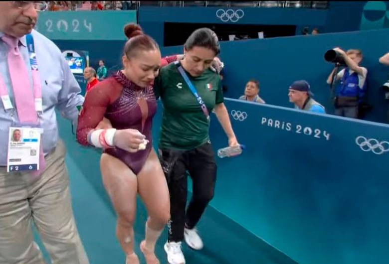 Natalia Escalera y sus muestras de dolor tras la exigencia en las barras asimétricas en los Juegos de París. En el recuadro, el australiano Matthew Dawson, jugador de hockey que se amputó un dedo. FOTOs getty