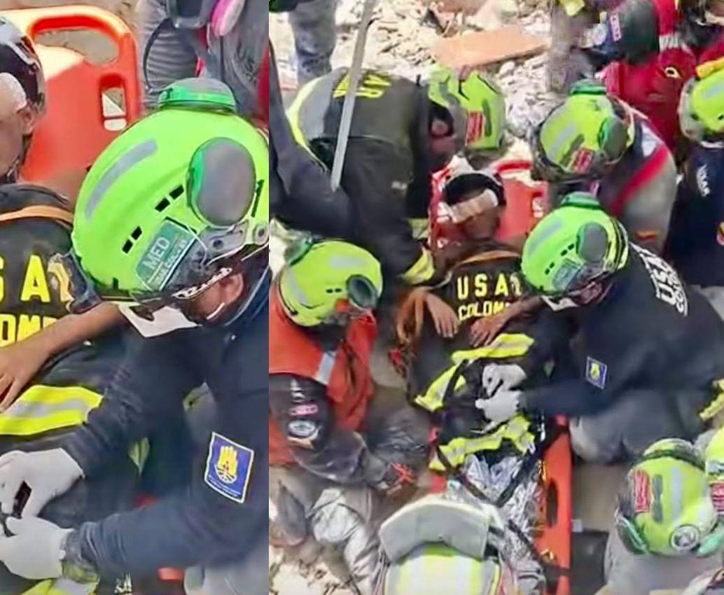 El equipo Usar Col-1, que tiene entre sus integrantes a ocho integrantes del Cuerpo de Bomberos de Envigado, rescataron a Moises, un niño de 11 años, en La Guaira. FOTOS: TOMADAS DE VIDEO