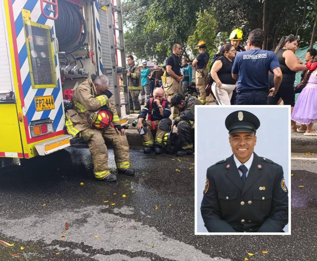 Los bomberos que estaban atendiendo la conflagración registrada dentro de una casa del barrio Toscana, de Medellín, lamentando la muerte de su compañero Iván Darío Posada Gómez, de 34 años. FOTOS:<b> CORTESÍA</b>