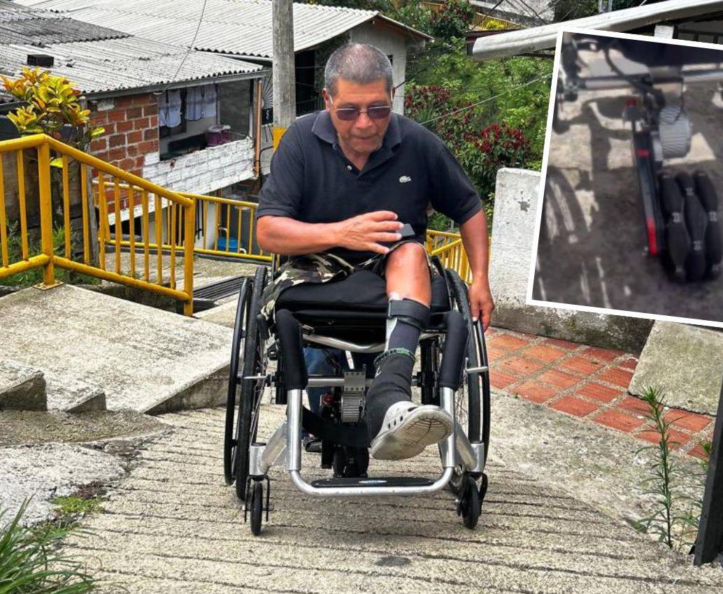 Héctor León Muñoz, de 56 años, pudo cumplir su sueño de poderse mover libremente con su silla de ruedas por las calles de San Antonio de Prado. Un motor con ruedas (detalle) que le adecuaron le permite subir las pendientes más inclinadas. FOTO: <b>FAISURY SÁNCHEZ ARREDONDO</b>