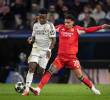 Richard Ríos junto a Vinícius Júnior en el partido entre el Real Madrid y el Benfica. FOTO GETTY