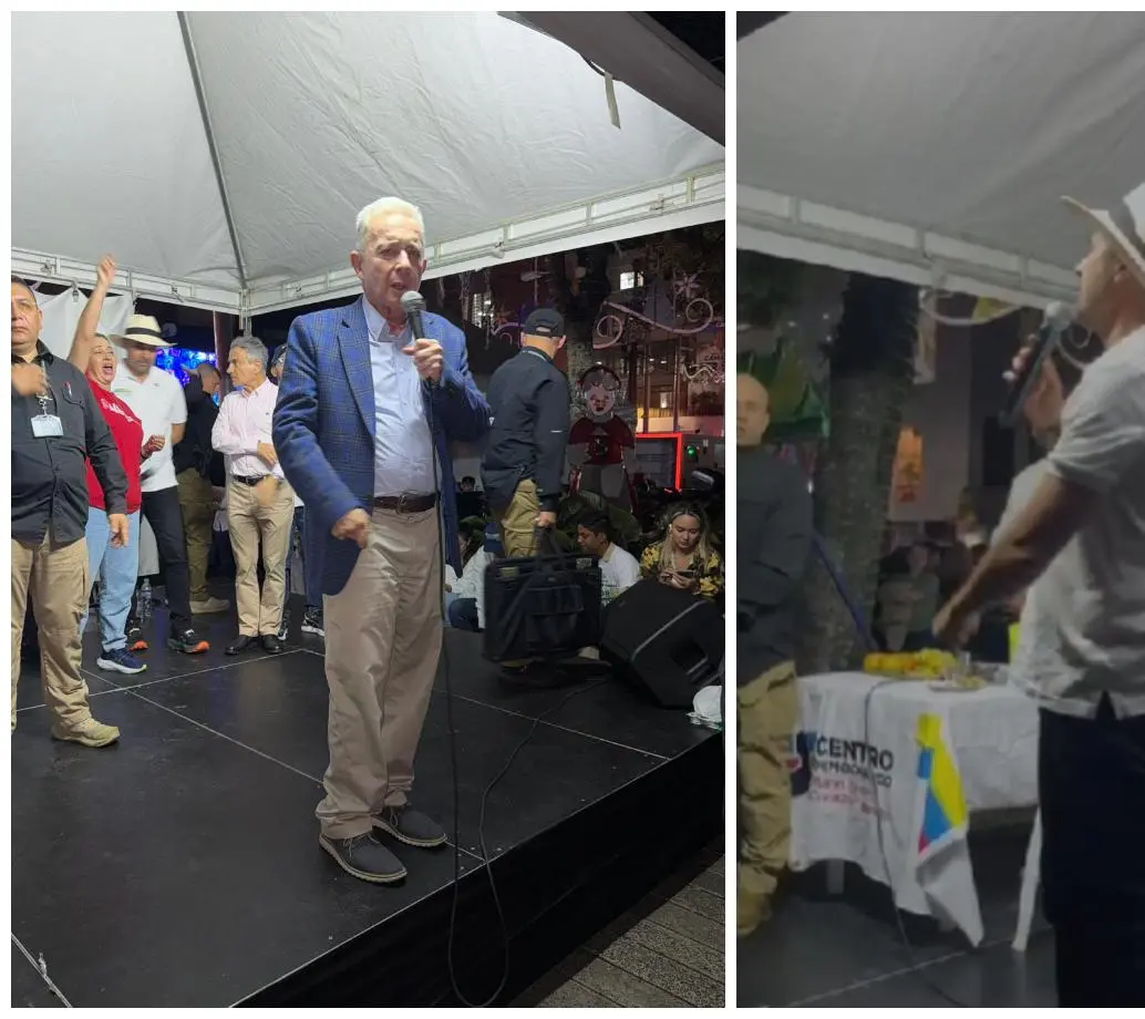 El expresidente Álvaro Uribe y el senador Andrés Guerra durante el evento en Itagüí en el que apagaron las luces. FOTOS: Cortesía
