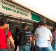 La central de liquidación de impuesto vehicular de la Gobernación de Antioquia, en el sótano de La Alpujarra, es uno de los puntos habilitados para el pago del impuesto vehicular, aunque se recomienda hacer uso de las plataformas virtuales. FOTO: MAURICIO PALACIO