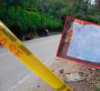 La víctima no ha sido identificada por las autoridades. El letrero estaban manuscrito en una hoja de cuaderno. FOTO: CORTESÍA.