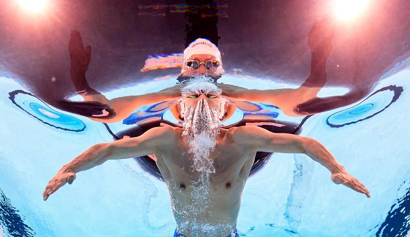 Sung Jae Cho, de República de Corea, compite en las semifinales de los 200 m braza masculinos. La imagen fue capturada con una cámara robótica submarina. Foto: GETTY