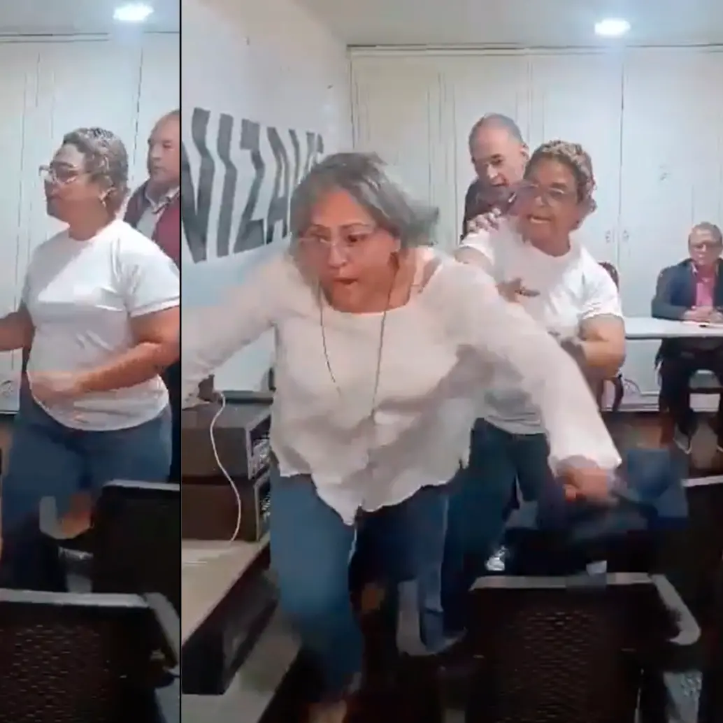 Este es el momento en el que la delegada Martha Tobón es empujada. FOTO CAPTURA DE PANTALLA