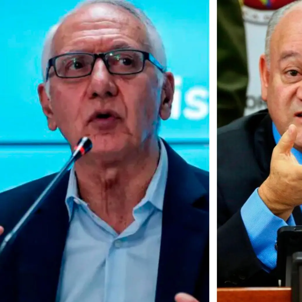 El ministro de Salud, Guillermo Jaramillo, y el magistrado de la Corte Constitucional, José Fernando Reyes Cuartas. FOTO COLPRENSA
