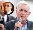 Expresidente Álvaro Uribe y el magistrado Carlos Roberto Solórzano Garavito. Foto: Colprensa