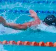 Emiliano Calle Bedoya en acción, durante la competencia en Cali, representando a Antioquia, aportando oro y récord en la prueba de los 50 metros mariposa. FOTO TOMADA INSTAGRAM
