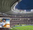 Adelante, el alcalde de Medellín junto al gerente del Inder y el vocero de LaLiga española. Atrás, como se vería el estadio en 2028. FOTO: Cortesía.