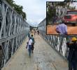 Adelante, un vehículo pesado pasando sobre el puente militar. Atrás, la estructura instalada sobre el río. FOTO: imágenes tomada de redes.
